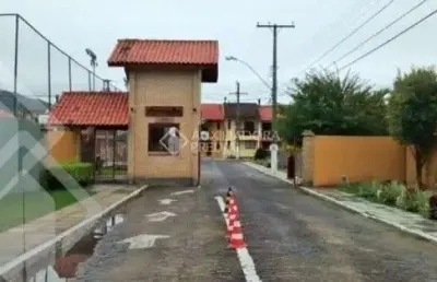 Casa em condomínio fechado com 2 quartos à venda na avenida edgar pires de castro, 1286, hípica, porto alegre, 72 m2 por r$ 275.000