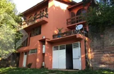 Casa em condomínio fechado com 4 quartos à venda na rua amapá, 836, vila nova, porto alegre, 279 m2 por r$ 1.200.000
