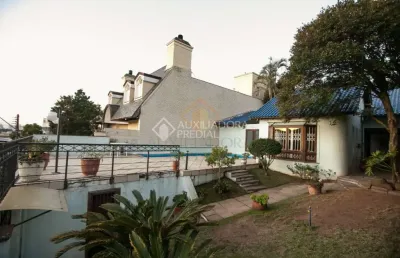 Casa em condomínio fechado com 5 quartos à venda na rua mozart, 133, três figueiras, porto alegre, 300 m2 por r$ 2.100.000