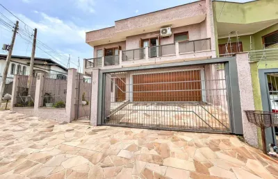 Casa com 3 quartos à venda na rua jaime zeltzer, 91, jardim américa, são leopoldo, 185 m2 por r$ 930.000