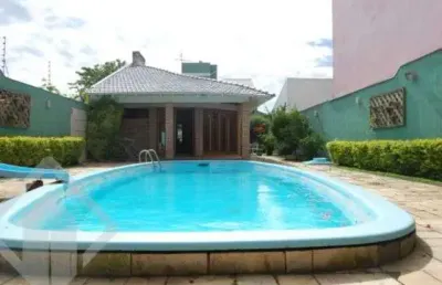 Casa em condomínio fechado com 4 quartos à venda na rua dulcimar cardoso, 340, paraíso, sapucaia do sul, 340 m2 por r$ 1.060.000
