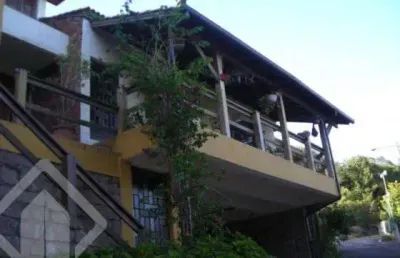 Casa com 4 quartos à venda na acesso hélio alves da rocha, 85, vila nova, porto alegre, 450 m2 por r$ 2.500.000