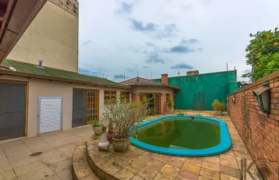 Casa com 6 quartos à venda na rua santa flora, 882, nonoai, porto alegre, 239 m2 por r$ 810.000