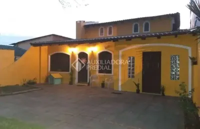 Casa em condomínio fechado com 3 quartos à venda na rua érico cramer, 40, camaquã, porto alegre, 309 m2 por r$ 639.000