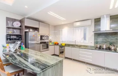 Casa em condomínio fechado com 4 quartos à venda na rua doutor campos velho, 1245, cristal, porto alegre, 332 m2 por r$ 1.300.000