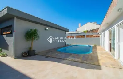 Casa com 3 quartos à venda na avenida pereira passos, 375, vila assunção, porto alegre, 221 m2 por r$ 1.650.000