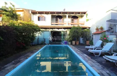 Casa com 4 quartos à venda na rua menezes paredes, 238, nonoai, porto alegre, 211 m2 por r$ 850.000