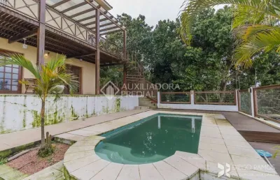 Casa com 4 quartos à venda na rua chiriguano, 265, vila assunção, porto alegre, 393 m2 por r$ 1.490.000