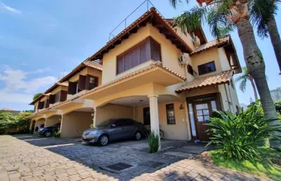 Casa em condomínio fechado com 3 quartos à venda na rua vicente failace, 252, tristeza, porto alegre, 219 m2 por r$ 1.400.000