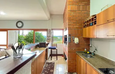 Casa com 4 quartos à venda na rua professor othon santos silva, 40, vila operária, porto alegre, 400 m2 por r$ 1.700.000