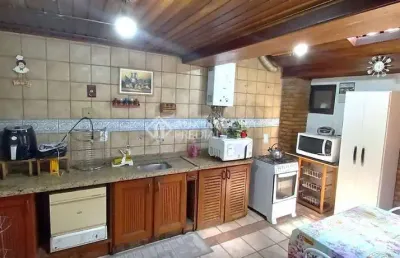Casa em condomínio fechado com 3 quartos à venda na avenida juca batista, 1490, cavalhada, porto alegre, 122 m2 por r$ 650.000