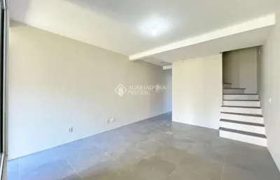 Casa em condomínio fechado com 3 quartos à venda na rua itacyr rossi, 33, guarujá, porto alegre, 122 m2 por r$ 559.000