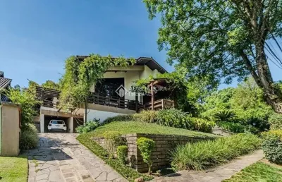 Casa em condomínio fechado com 4 quartos à venda na avenida firmino octávio bimbi, 255, cavalhada, porto alegre, 300 m2 por r$ 2.300.000