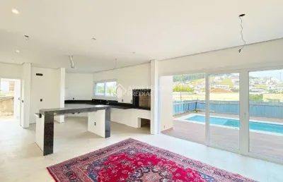 Casa em condomínio fechado com 3 quartos à venda na estrada das três meninas, 2000, vila nova, porto alegre, 346 m2 por r$ 2.850.000