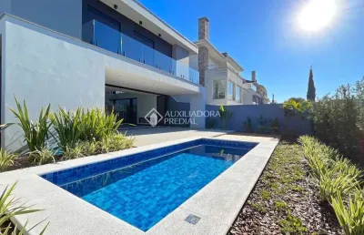 Casa em condomínio fechado com 4 quartos à venda na estrada das três meninas, 2001, vila nova, porto alegre, 299 m2 por r$ 2.950.000