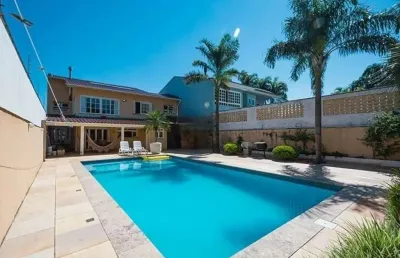 Casa com 4 quartos à venda na avenida saul nonnenmacher, 112, ipanema, porto alegre, 452 m2 por r$ 1.350.000