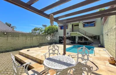 Casa com 4 quartos à venda na rua são sebastião do cai, 50, camaquã, porto alegre, 235 m2 por r$ 749.000