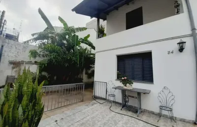 Casa com 3 quartos à venda na rua barão de cerro largo, 34, menino deus, porto alegre, 300 m2 por r$ 1.600.000