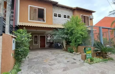 Casa em condomínio fechado com 3 quartos à venda na rua pau brasil, 581, hípica, porto alegre, 142 m2 por r$ 560.000