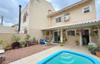 Casa em condomínio fechado com 2 quartos à venda na rua guatambu, 280, hípica, porto alegre, 122 m2 por r$ 649.000