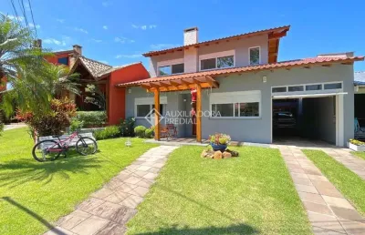 Casa em condomínio fechado com 3 quartos à venda na avenida juca batista, 1200, cavalhada, porto alegre, 250 m2 por r$ 1.700.000