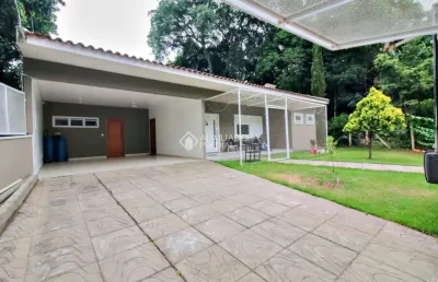 Casa em condomínio fechado com 4 quartos à venda na professor bolívar fontoura, 450, vila nova, porto alegre, 220 m2 por r$ 1.290.000