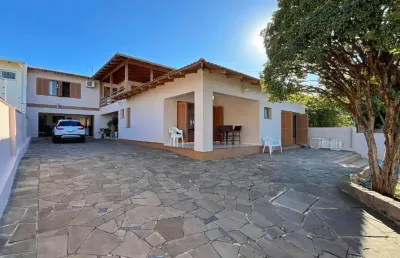 Casa com 4 quartos à venda na rua atílio supertti, 623, vila nova, porto alegre, 400 m2 por r$ 970.001