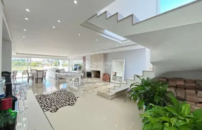 Casa em condomínio fechado com 4 quartos à venda na avenida juca batista, 9000, belém novo, porto alegre, 340 m2 por r$ 2.750.000