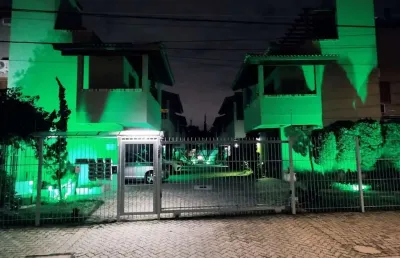 Casa em condomínio fechado com 2 quartos à venda na avenida guarujá, 126, guarujá, porto alegre, 102 m2 por r$ 430.000