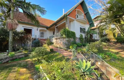 Casa com 4 quartos à venda na rua doutor possidônio cunha, 16, vila assunção, porto alegre, 374 m2 por r$ 1.590.000