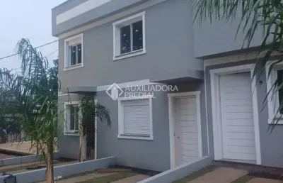 Casa em condomínio fechado com 2 quartos à venda na rua frederico etzberger, 650, nonoai, porto alegre, 54 m2 por r$ 370.000