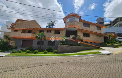Casa em condomínio fechado com 3 quartos à venda na rua alcebíades antônio dos santos, 605, nonoai, porto alegre, 400 m2 por r$ 1.691.000