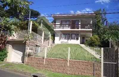 Casa em condomínio fechado com 3 quartos à venda na rua liberal, 97, tristeza, porto alegre, 320 m2 por r$ 1.390.000