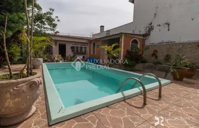 Casa em condomínio fechado com 3 quartos à venda na avenida capivari, 391, cristal, porto alegre, 300 m2 por r$ 1.590.000