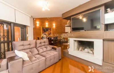 Casa em condomínio fechado com 3 quartos à venda na avenida jacuí, 978, cristal, porto alegre, 365 m2 por r$ 1.290.000