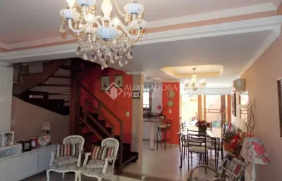 Casa em condomínio fechado com 2 quartos à venda na avenida edgar pires de castro, 1286, hípica, porto alegre, 212 m2 por r$ 505.000