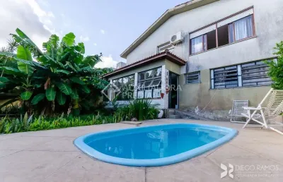 Casa em condomínio fechado com 3 quartos à venda na rua cariri, 46, vila assunção, porto alegre, 284 m2 por r$ 1.380.000