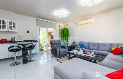 Casa em condomínio fechado com 3 quartos à venda na rua jerolomo minuzo, 107, vila nova, porto alegre, 268 m2 por r$ 1.100.000