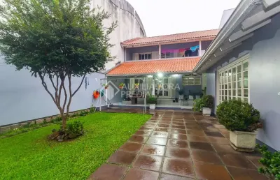 Casa com 4 quartos à venda na rua doutor barcelos, 2628, tristeza, porto alegre, 308 m2 por r$ 1.200.000