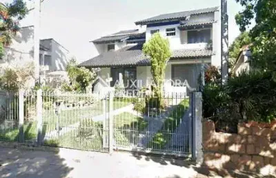 Casa com 5 quartos à venda na rua doutor mário totta, 2087, tristeza, porto alegre, 379 m2 por r$ 1.790.000