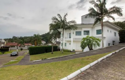 Casa em condomínio fechado com 4 quartos à venda na rodovia haroldo soares glavan, 929, cacupé, florianópolis, 484 m2 por r$ 3.700.000