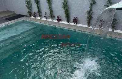 Sobrados,3 suítes, com piscina com fino acabamento e sobra terreno .