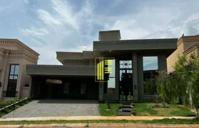 Vende-se casa térrea com 04 suítes, 06 wc com piscina aquecida no condomínio quinta do golfe.