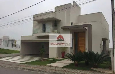 Casa com 4 dormitórios, 450 m² - venda por r$ 3.150.000,00 ou aluguel por r$ 17.200,00/mês - condomínio residencial jaguary - são josé dos campos/sp