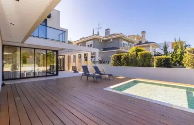 Casa em condomínio luxuoso com 4 suítes, sendo 1 no piso térreo! piscina aquecid