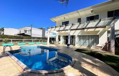 Casa em condomínio fechado com 4 quartos à venda na avenida rodesindo pavan, 7201, praia do estaleiro, balneário camboriú, 452 m2 por r$ 7.300.000
