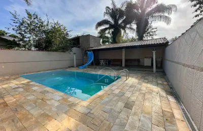 Casa térrea com piscina à venda com piscina, 3 quarto(s),  sendo 1 suíte(s)  no bairro garça vermelha, 650 metros da praia, peruíbe-sp