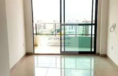 Vendo apartamento com 64m², 2 quartos s/ 1 suíte, sala p/ 2 ambientes e 2 vagas