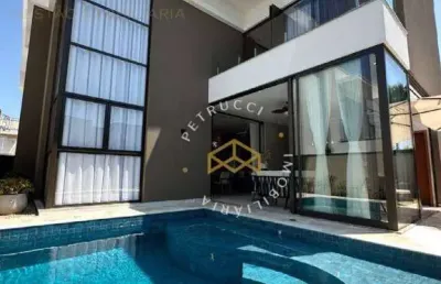 Casa com 3 dormitórios à venda, 311 m² por r$ 2.990.000,00 - loteamento parque dos alecrins - campinas/sp
