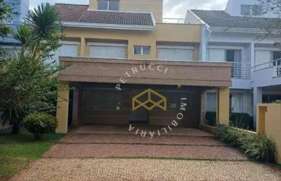Casa à venda no condomínio parque portugal em campinas no bairro taquaral.